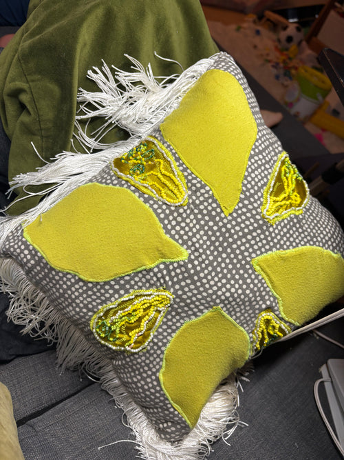 Fringe and dots pillow